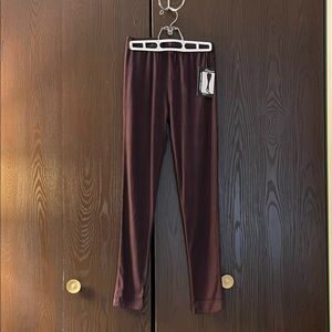 Donmani stretch dark brown jeggings. One Size. I would say small or medium. NWT